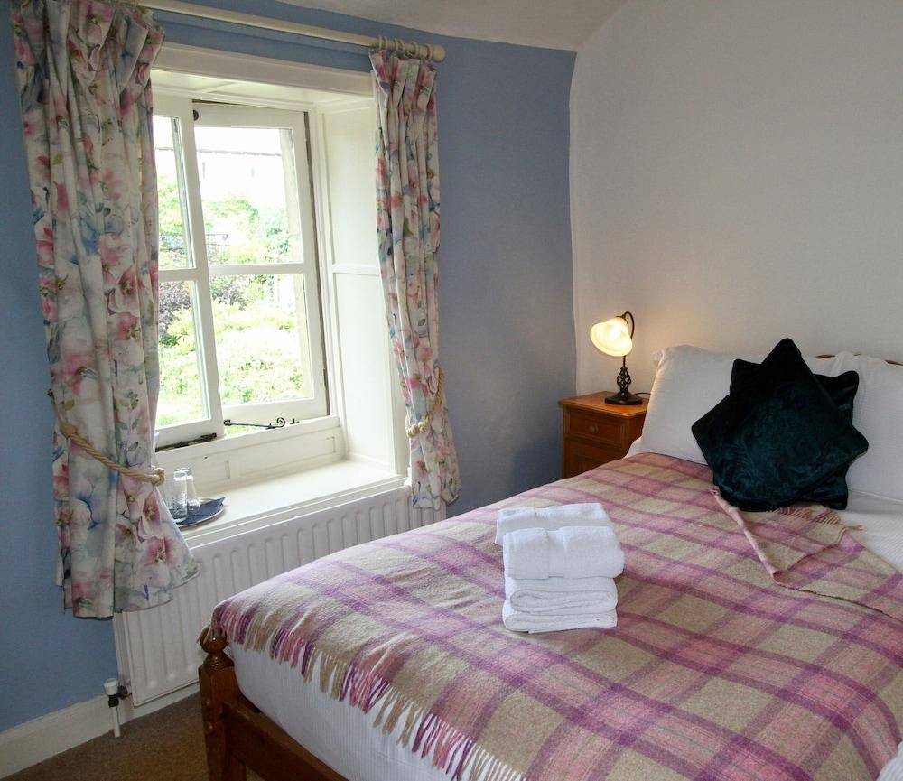 Ashfield House Hotell Grassington Exteriör bild A bedroom at the Old Post Office
